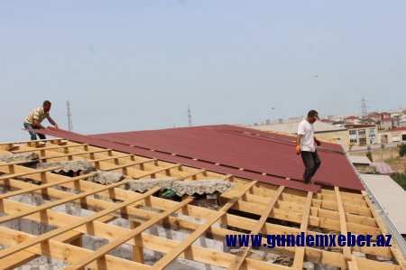 Abşeronda 38 çoxmənzilli binanın dam örtüyü yenilənib