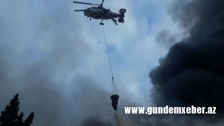 “EuroHome”da yanğını söndürmək üçün üç helikopter cəlb olundu - FOTO