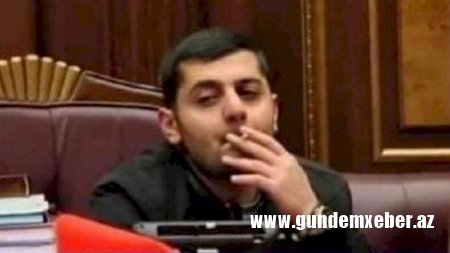 Spikerin kreslosunda siqaret çəkən gənci öldürdülər
