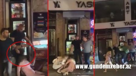 Qadını gecə klubundan sürüyərək çıxarıb döydülər - VİDEO